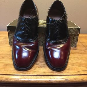 Men’s dress cordovan/black saddle shoe, classic.